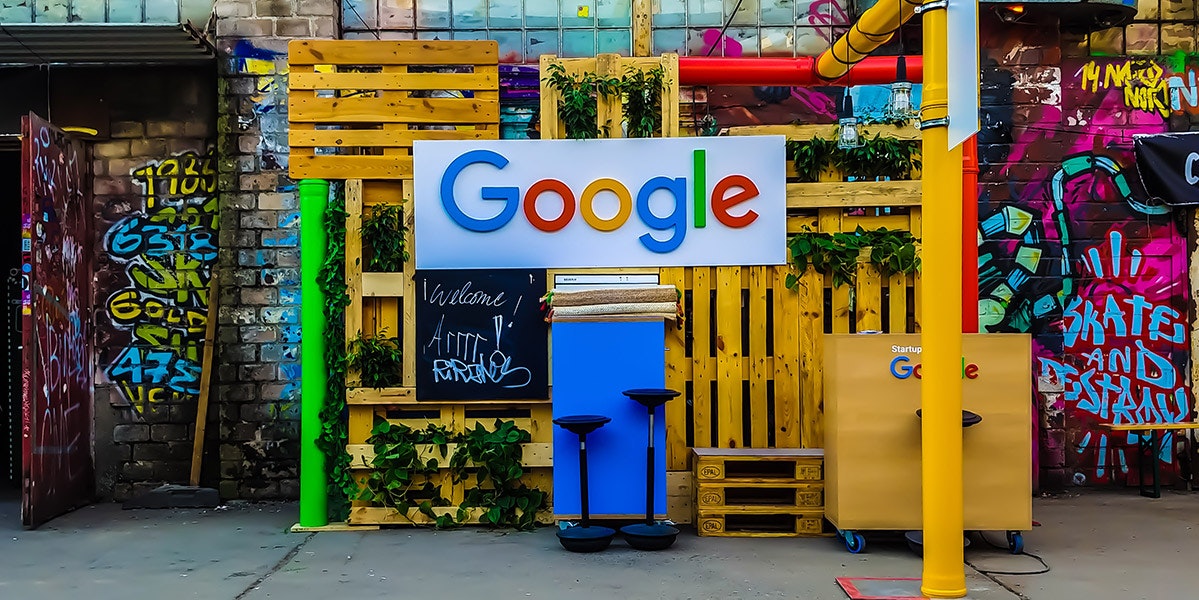 In-Focus: Driving Sales Through Google Shopping with Ambition's Anders Dohrn Girl on a computer looking at image-editing software